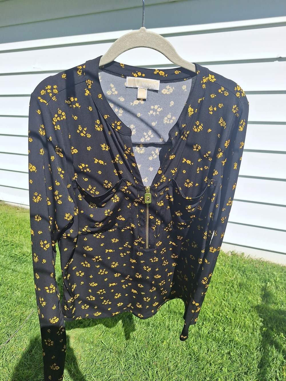 MICHAEL Michael Kors Black Long Sleeve Top with Yellow Floral Print.